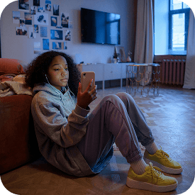 young woman sitting viewing smartphone